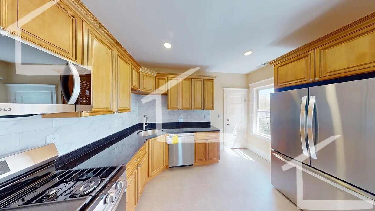 Primary Photo - Fully Renovated Unit in Oak Sq. In-Unit Wa...