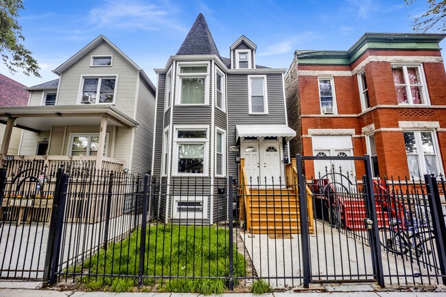 Building Photo - 1821 N Tripp Ave