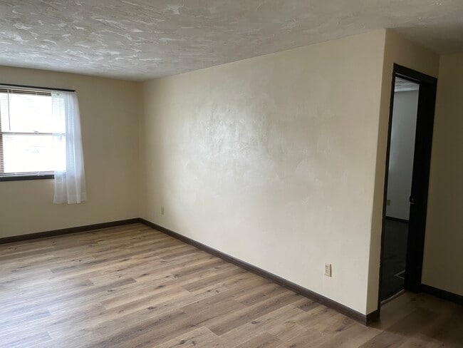 sala de estar Grass Roots Properties LLC - 115 S Clinton St