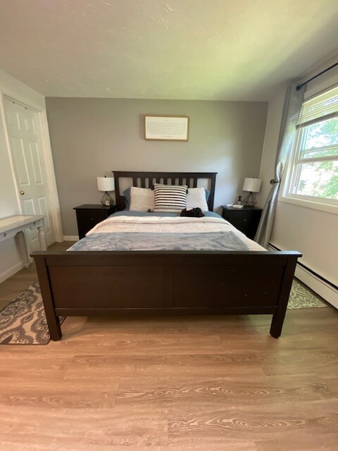 Bedroom, full queen set with bedside tables, linens, etc.. - 802 Cocheco Ct