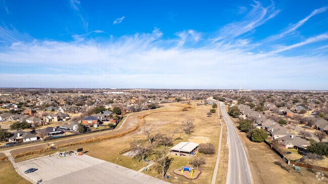 Residents gather at Willow Creek Park in Saginaw.