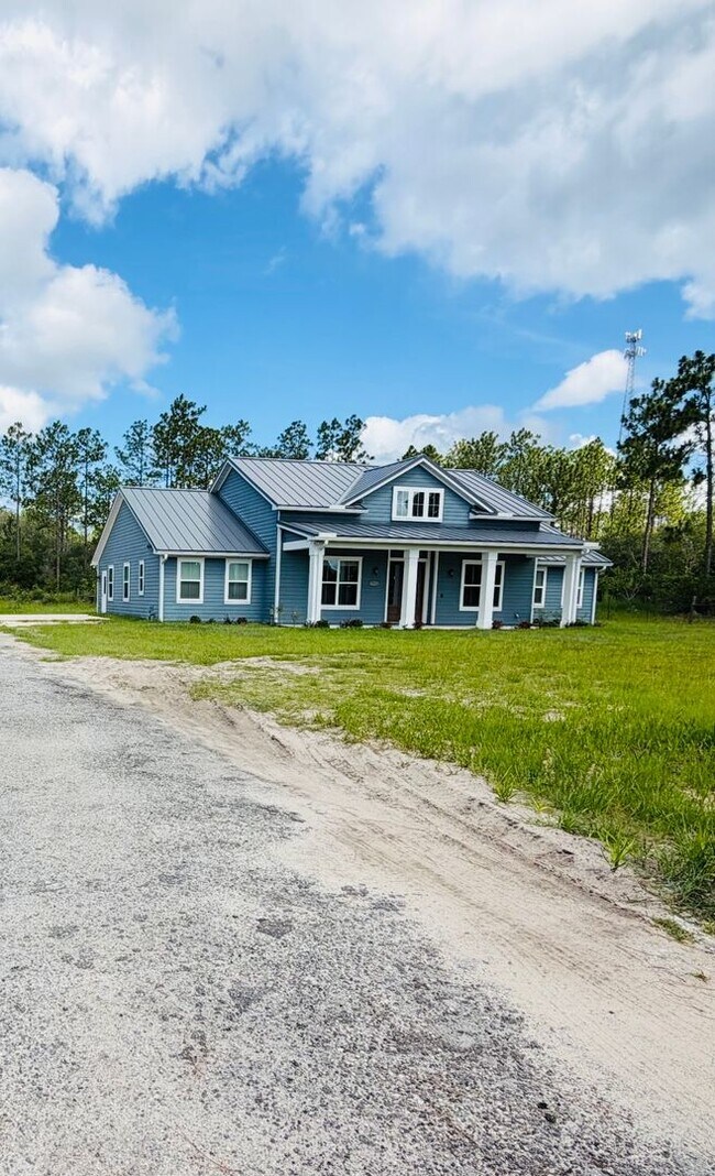Building Photo - Gated 10-Acre Luxury Retreat with 40x60 Shop & Barn!