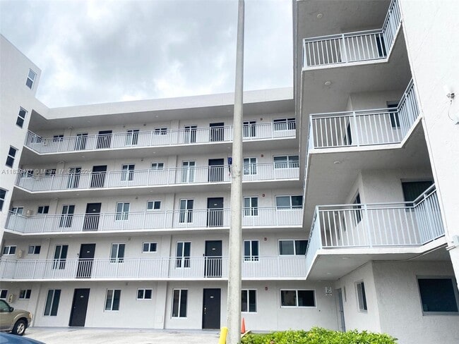 Building Photo - 9911 W Okeechobee Rd