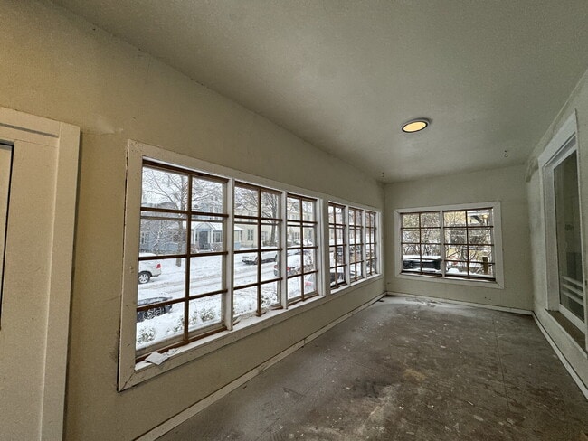 Building Photo - "Spacious 3-Bedroom Minneapolis Gem with Gleaming Hardwood Floors & 2 Full Baths!"