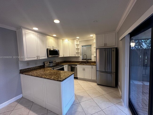 Foto del edificio - 7671 Courtyard Run W