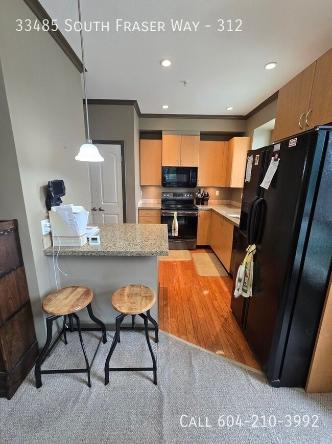 Photo du bâtiment - Spacious Condo in Downtown Abbotsford