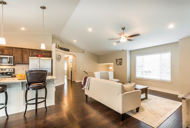 Building Photo - Fenced-in Yard + 3-Car Garage + Finished B...