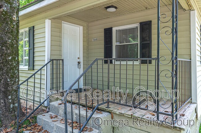 Foto del edificio - 7049 Happy Hollow Rd
