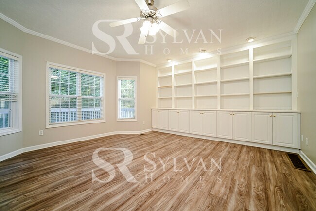 Building Photo - Welcome to this charming abode.
