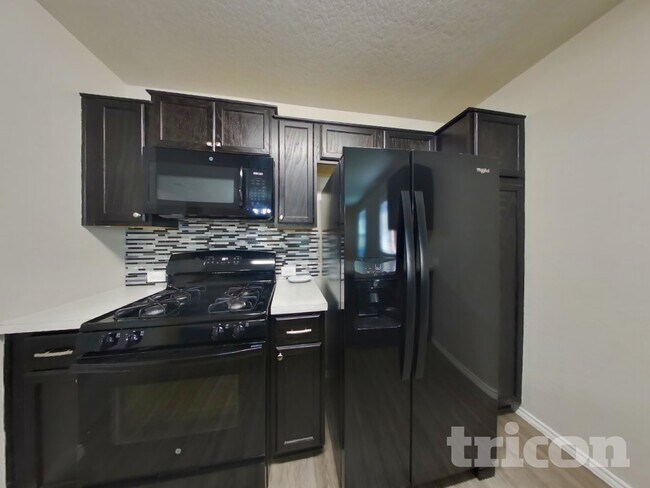 Building Photo - 7022 Cozy Run