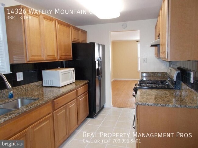 Foto del edificio - Qualify for a zero deposit? Granite Counters