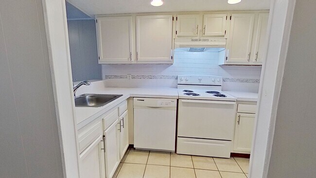 Building Photo - Beach Living at it's Best!  Two Bedroom/On...