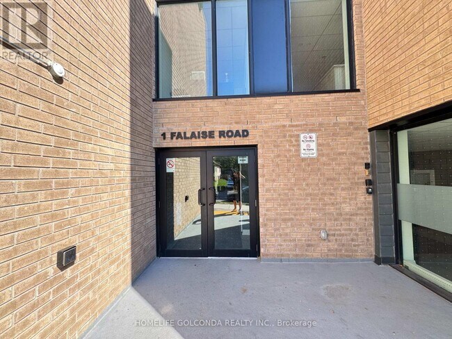 Photo du bâtiment - 1-611 Falaise Rd
