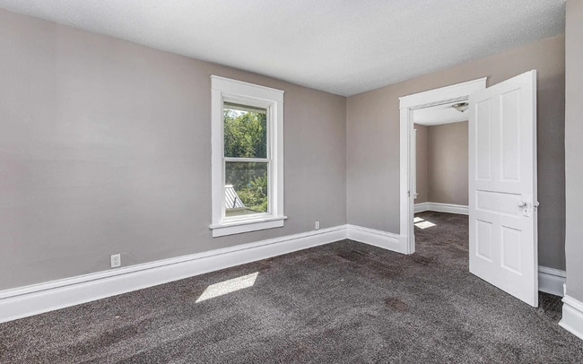 Foto del edificio - Charming 3-bedroom 1-bathroom single family house rental with a fenced in yard