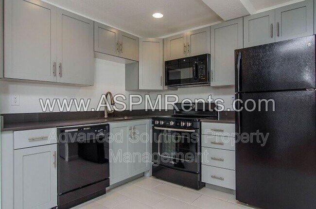 Foto del edificio - 619-623 E 5th Ave