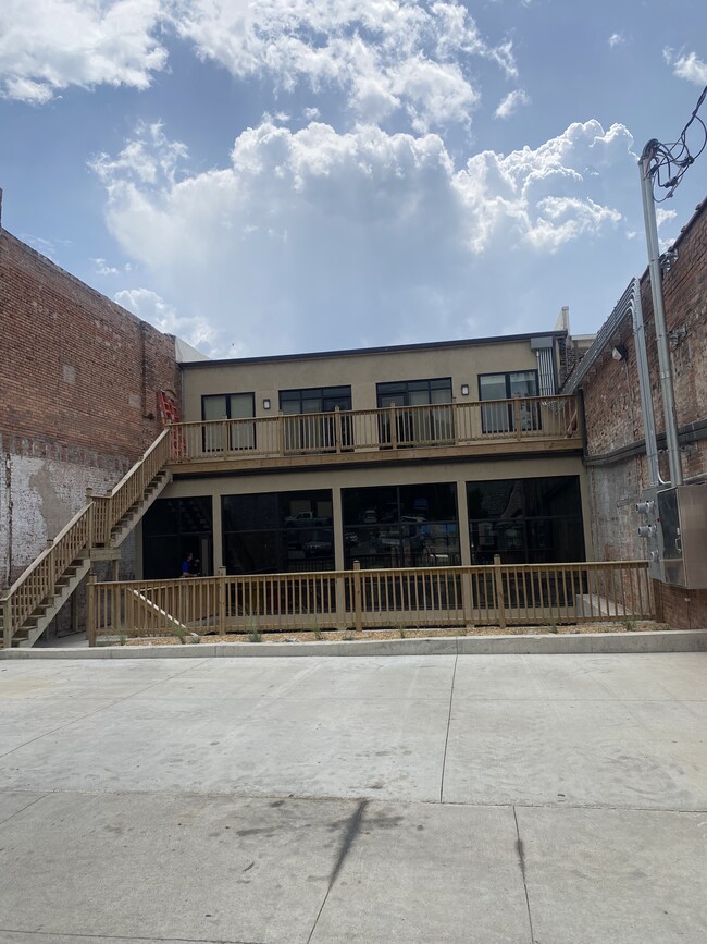 Rear entrance with Off Street Parking (1 space) - 307 E Main St