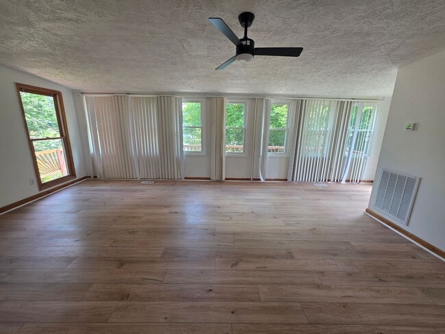 Building Photo - Updated Lake House in Crossville with Private Dock, Wrap-Around Porch & Lake Access