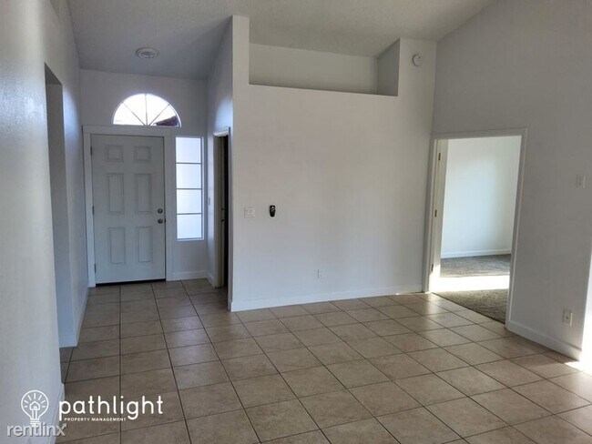 Building Photo - 4 br, 2 bath House - 8520 W Roma Avenue UNIT