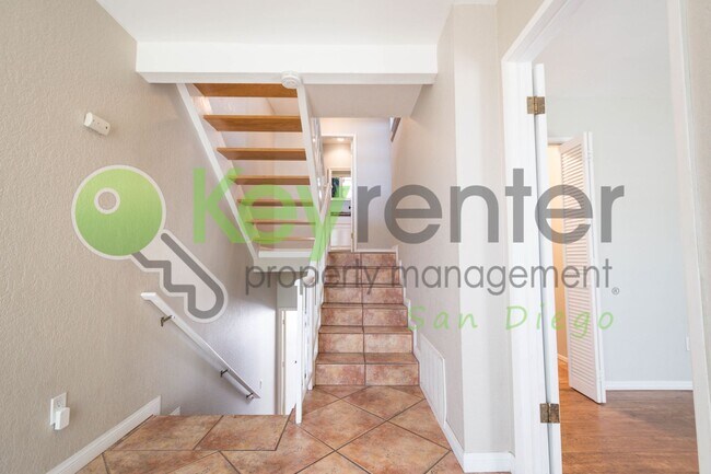 Building Photo - Highly Desired La Costa Townhome end-unit ...
