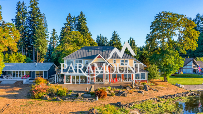 Building Photo - GORGEOUS 4 Bedroom Waterfront Oasis!