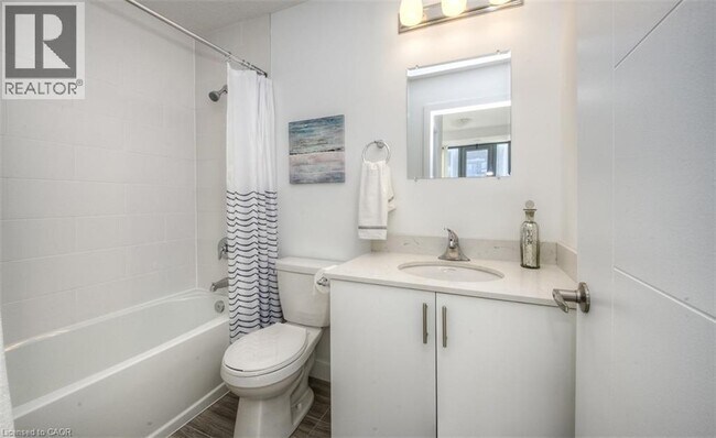 Photo du bâtiment - 1438 Highland Rd W