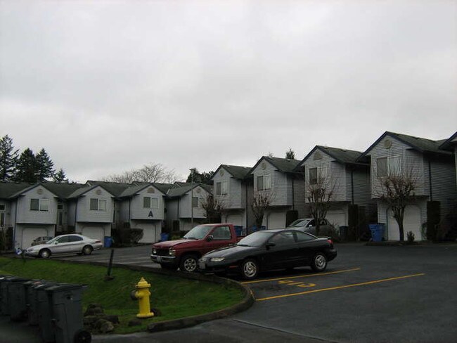 Building Photo - TWO BEDROOM TOWN HOME STYLE WITH GARAGE