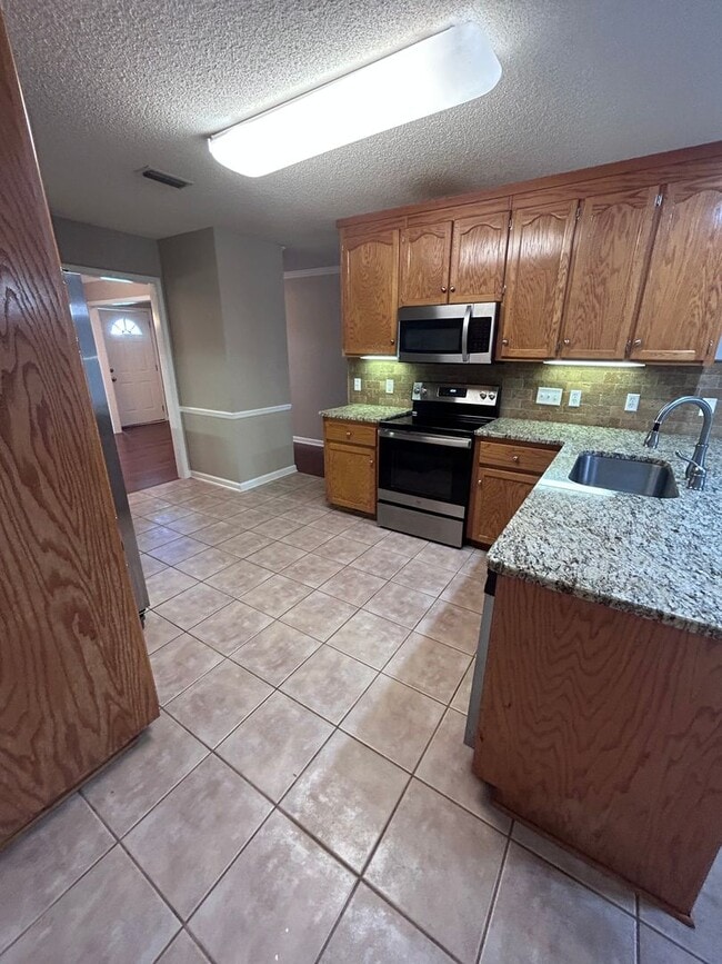 Building Photo - 1/2 of the first month's rent with a 12-mo...