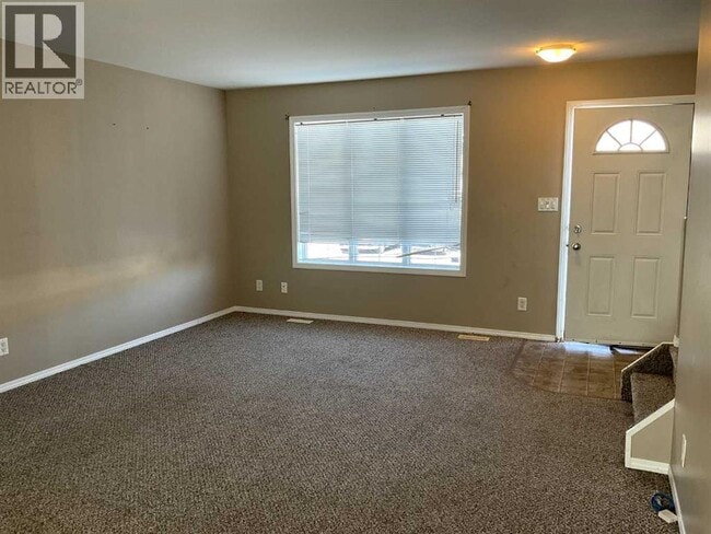 Building Photo - 1811-1849 49 Ave