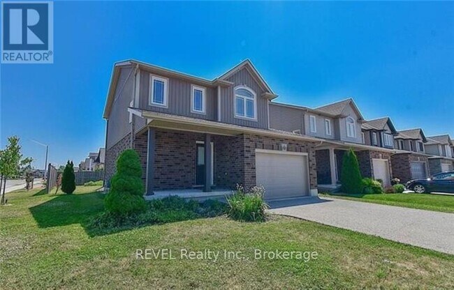 Photo du bâtiment - 6030 Wiens Blvd