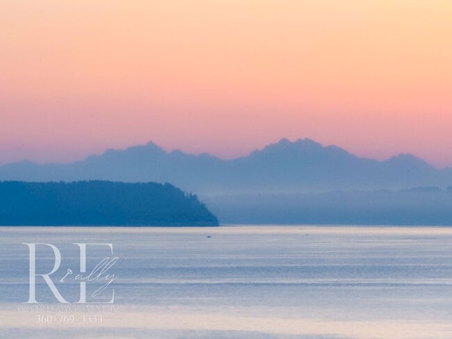 Photo - Waterfront Rustic Retreat with Vaulted Ceilings, Picture Windows & Lofted Nook