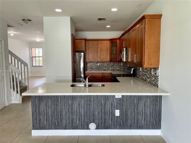 Foto del edificio - 5980 NW 104th Ct