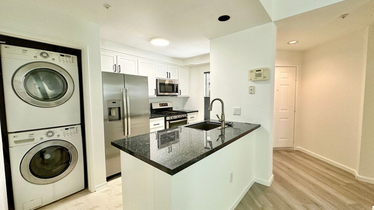 Primary Photo - Bright + Spacious First-Floor Condo in Par...