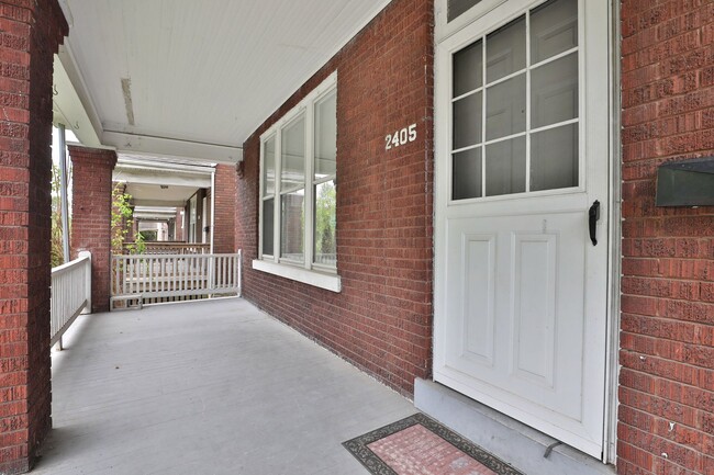 Building Photo - Charming 5-Bedroom Home with Exposed Brick...