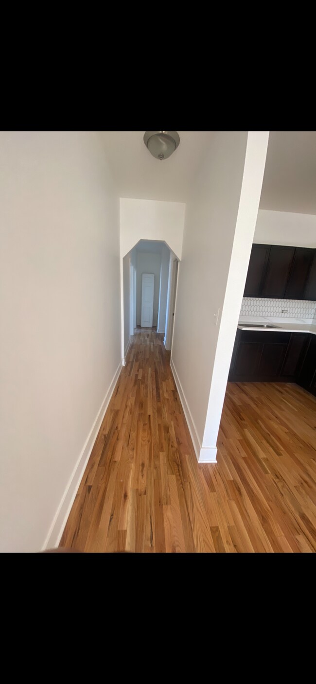 hallway to bedrooms - 3457 S Prairie Ave
