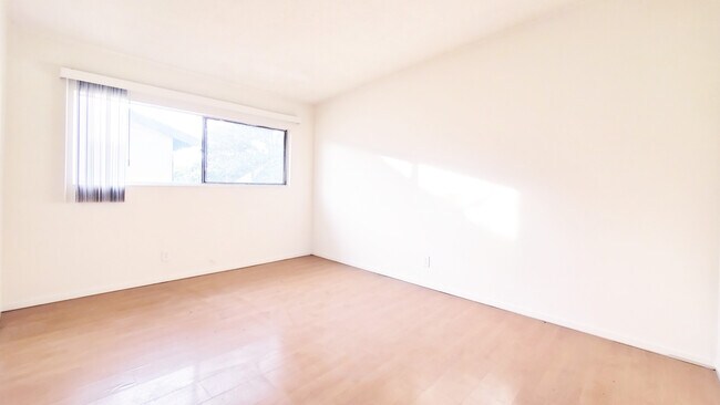 Bedroom of a similar apartment at property - 1818 W Sumac Ln