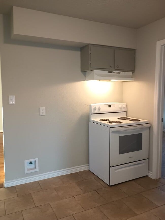 Building Photo - Ready just in time for the Holidays! Recen...