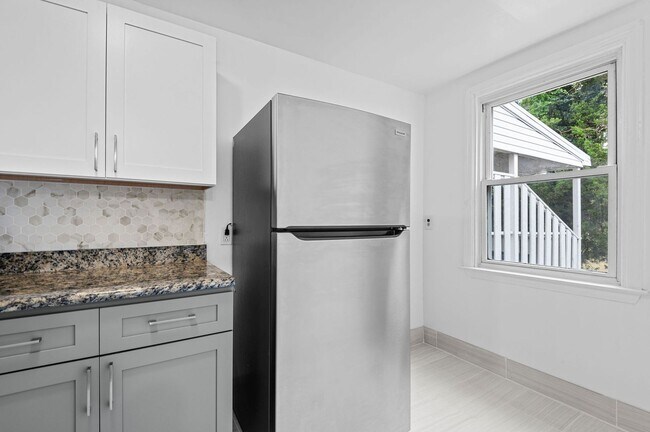 Building Photo - 1st MONTH FREE!* Newly renovated kitchen w...