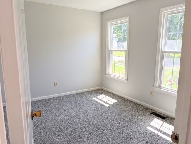 First floor front right bedroom connects to first floor bathroom - 3221 Hunters Point Dr