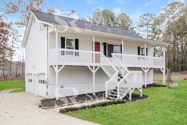 Foto del edificio - The living is easy in this 4 bedroom, 2 ba...