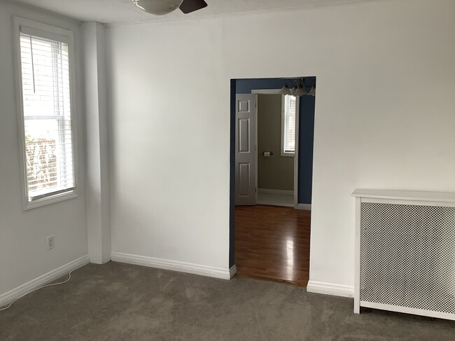 Enter in the living room with the office beyond. The ceilings on the main level are 8'10" tall. - 11 Jay St