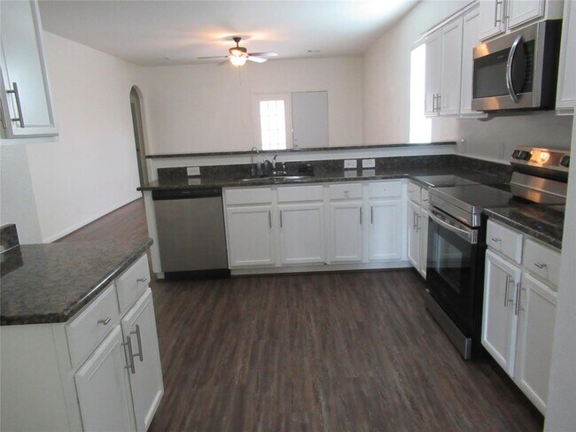Building Photo - 1306 Wallflower Ave