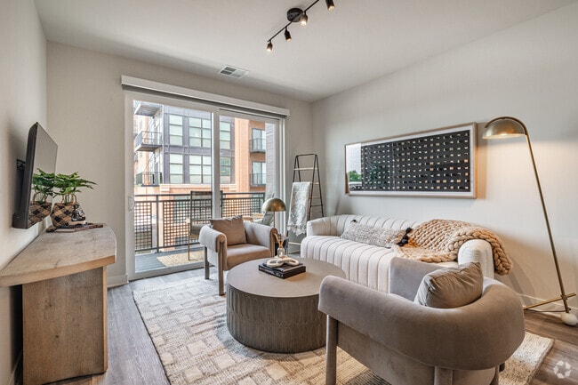 1BR, 1BA - 770SF - Living Room - The Dawson - IL