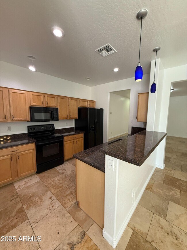 Foto del edificio - 7024 W Alta Vista Rd