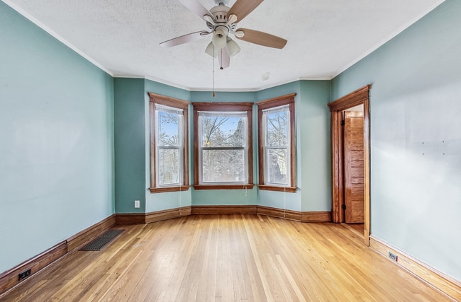 Primary living room with west-facing windows - 3747 N Kostner Ave