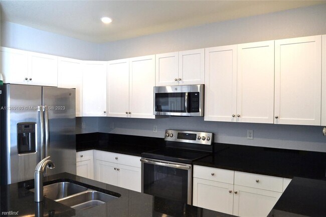 Building Photo - 3 br, 2.5 bath House - 3367 W 106th Ter # ...