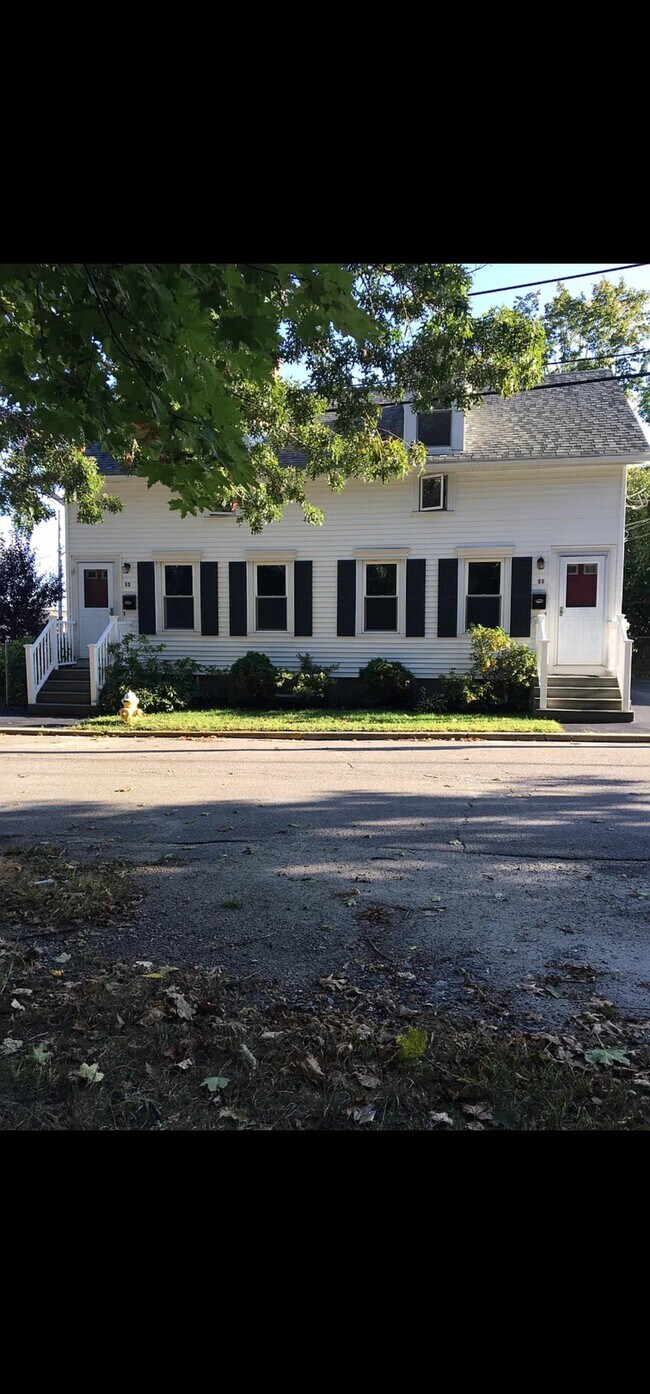 This lovely three-bedroom duplex is located in the Saylesville section of Lincoln. - 11 Gardiner Ave