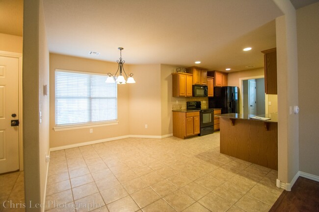 Building Photo - Three bedroom Home with Hardwood Floors Th...