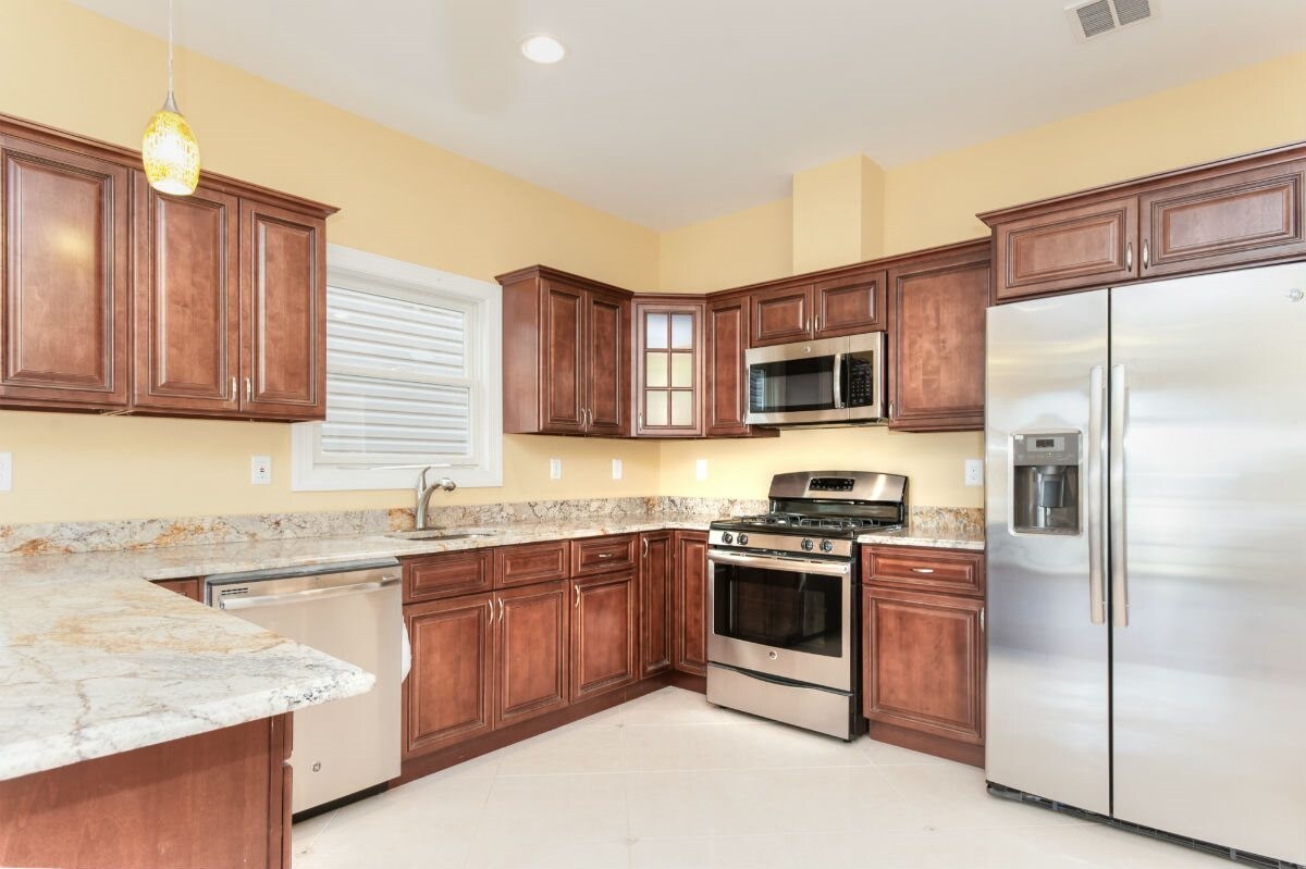 Stainless steel appliances with granite - 58 S Broadway