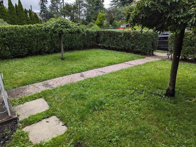 Foto del edificio - Cozy Single-Family Home with 2 Bedrooms an...