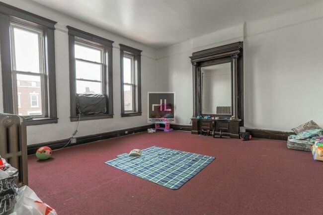 Building Photo - 74-40-74-44 44th Ave